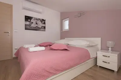 Krevet ili kreveti u jedinici u objektu Apartments with a parking space Makarska - 6720