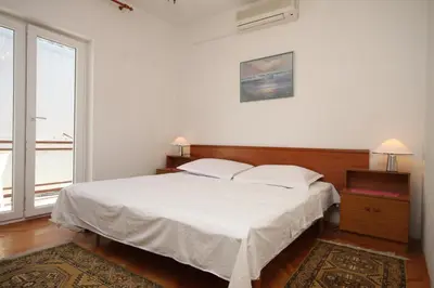 Krevet ili kreveti u jedinici u objektu Apartments with parking space Baska Voda, Makarska - 6773