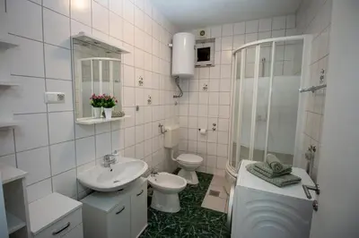 Kupaonica u objektu Apartments by the sea Duce, Omis - 7576