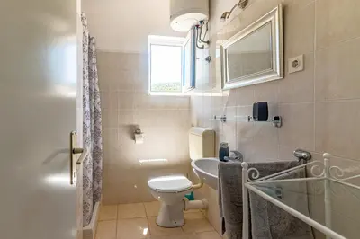 Kupaonica u objektu Apartments by the sea Cove Pokrivenik, Hvar - 4604