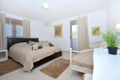 Krevet ili kreveti u jedinici u objektu Holiday house with a swimming pool Basina, Hvar - 8731