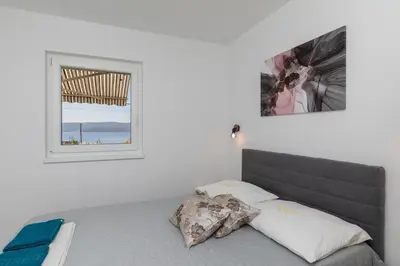 Krevet ili kreveti u jedinici u objektu Apartments with parking space Stanici, Omis - 11421