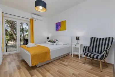 Krevet ili kreveti u jedinici u objektu Apartments by the sea Brela, Makarska - 2713