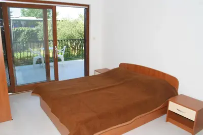 Krevet ili kreveti u jedinici u objektu Apartments and rooms by the sea Duce, Omis - 2746