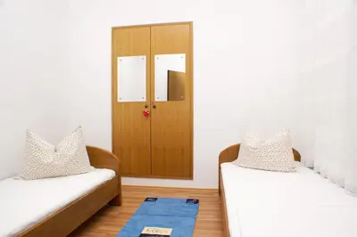 Krevet ili kreveti u jedinici u objektu Apartments by the sea Sumpetar, Omis - 2965