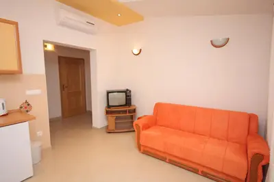 TV i/ili zabavni centar u objektu Apartment Baska Voda 2709d