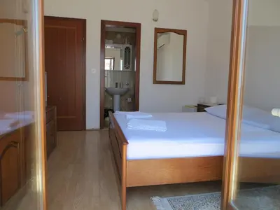Krevet ili kreveti u jedinici u objektu Apartments and Rooms Rogosic