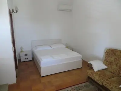 Krevet ili kreveti u jedinici u objektu Apartments and Rooms Rogosic
