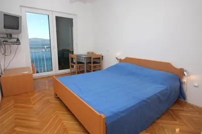 Krevet ili kreveti u jedinici u objektu Apartments by the sea Balica Rat, Omis - 5957