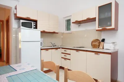Kuhinja ili čajna kuhinja u objektu Apartments by the sea Balica Rat, Omis - 5957