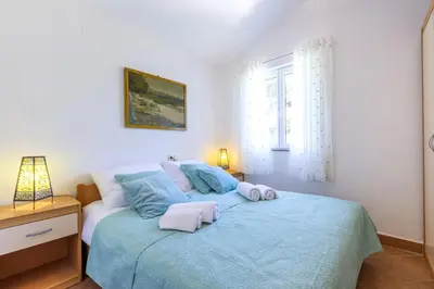 Krevet ili kreveti u jedinici u objektu Apartments by the sea Jelsa, Hvar - 8729