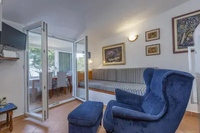 TV i/ili zabavni centar u objektu Apartment Jelsa 8729a