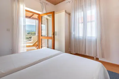 Krevet ili kreveti u jedinici u objektu Apartment Jelsa 11319a