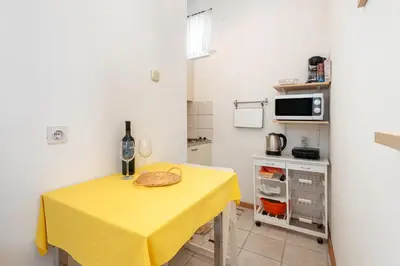 Kuhinja ili čajna kuhinja u objektu Apartments by the sea Jelsa, Hvar - 11319