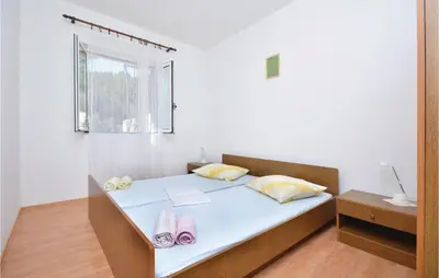 Krevet ili kreveti u jedinici u objektu Apartment Ivan Dolac With Sea View Xii