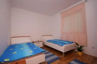 Krevet ili kreveti u jedinici u objektu Apartments Beverly