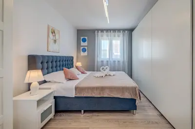 Krevet ili kreveti u jedinici u objektu SUMMER ORCHID - Spacious Duplex By The Beach & PS5