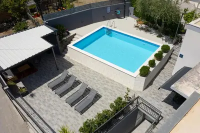 Bazen u objektu Apartments Lidija - sea view apartment with exclusive right of using hot tub or split level apartment with exclusive right of using pool ili u blizini