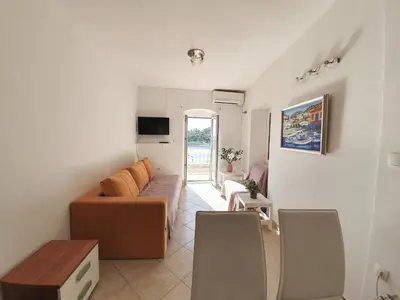TV i/ili zabavni centar u objektu Holiday Home Meditation