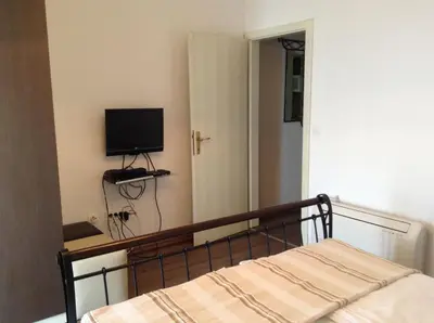 TV i/ili zabavni centar u objektu Apartments Vila Oksana