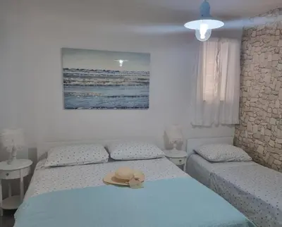 Krevet ili kreveti u jedinici u objektu Nina