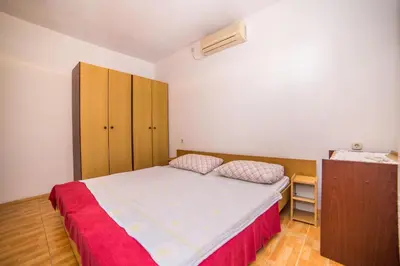 Krevet ili kreveti u jedinici u objektu Apartments and Rooms Drpić