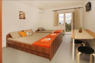 Krevet ili kreveti u jedinici u objektu Apartments by the sea Baska Voda, Makarska - 6786