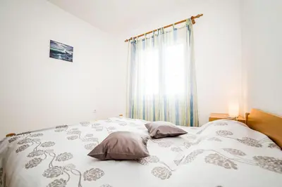 Krevet ili kreveti u jedinici u objektu Apartments Bakula 1539