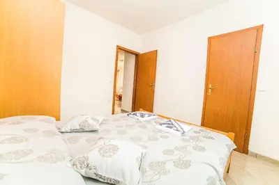 Krevet ili kreveti u jedinici u objektu Apartments Bakula 1539