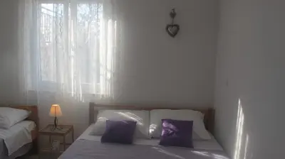 Krevet ili kreveti u jedinici u objektu Magi House with pool