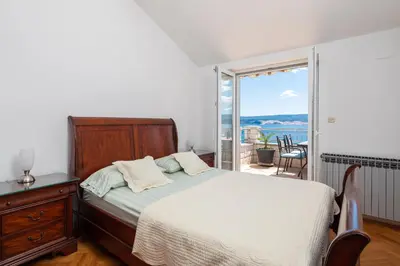 Krevet ili kreveti u jedinici u objektu Beachfront XXL - 2 Apartments Together -