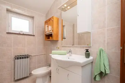 Kupaonica u objektu Beachfront XXL - 2 Apartments Together -