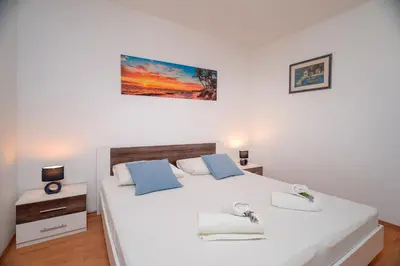 Krevet ili kreveti u jedinici u objektu Apartments Lucic
