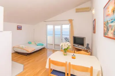 TV i/ili zabavni centar u objektu Apartments Cihorich