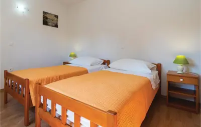 Krevet ili kreveti u jedinici u objektu Holiday Home Povlja With Sea View I