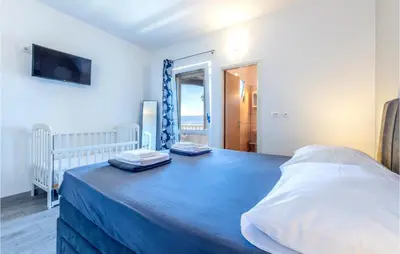 Krevet ili kreveti u jedinici u objektu Apartment Jesenice With Sea View I