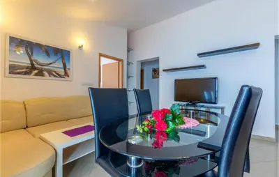 TV i/ili zabavni centar u objektu Apartment Jesenice With Sea View Ii