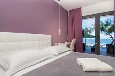 Krevet ili kreveti u jedinici u objektu Luxury rooms Beach Mediteran