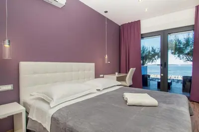 Krevet ili kreveti u jedinici u objektu Luxury rooms Beach Mediteran