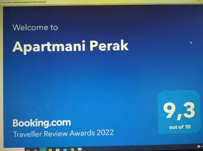 Certifikat, nagrada, logo ili neki drugi dokument izložen u objektu Apartmani Perak