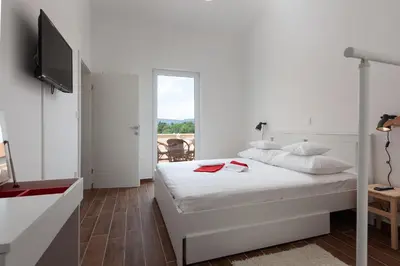 Krevet ili kreveti u jedinici u objektu Kvasina Apartments