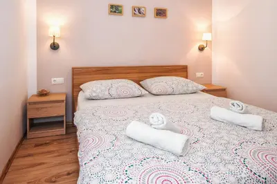 Krevet ili kreveti u jedinici u objektu Sunny Apartments