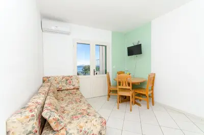 TV i/ili zabavni centar u objektu Apartments Laguna
