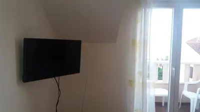 TV i/ili zabavni centar u objektu Apartments Zvone,place by the sea