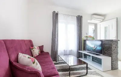 TV i/ili zabavni centar u objektu Apartments with a parking space Podstrana, Split - 11699
