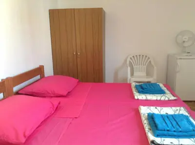 Krevet ili kreveti u jedinici u objektu Guest house Perfect Location