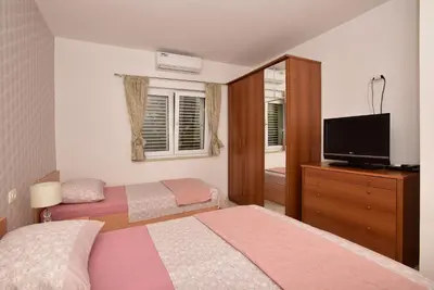 Krevet ili kreveti u jedinici u objektu Ivana Apartments