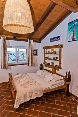 Krevet ili kreveti u jedinici u objektu Apartments Villa Marcelina