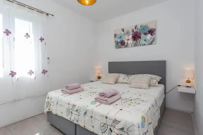 Krevet ili kreveti u jedinici u objektu Apartments Edi