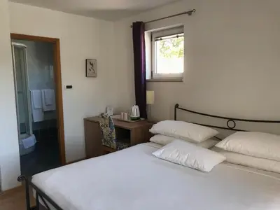 Krevet ili kreveti u jedinici u objektu Pink Inn